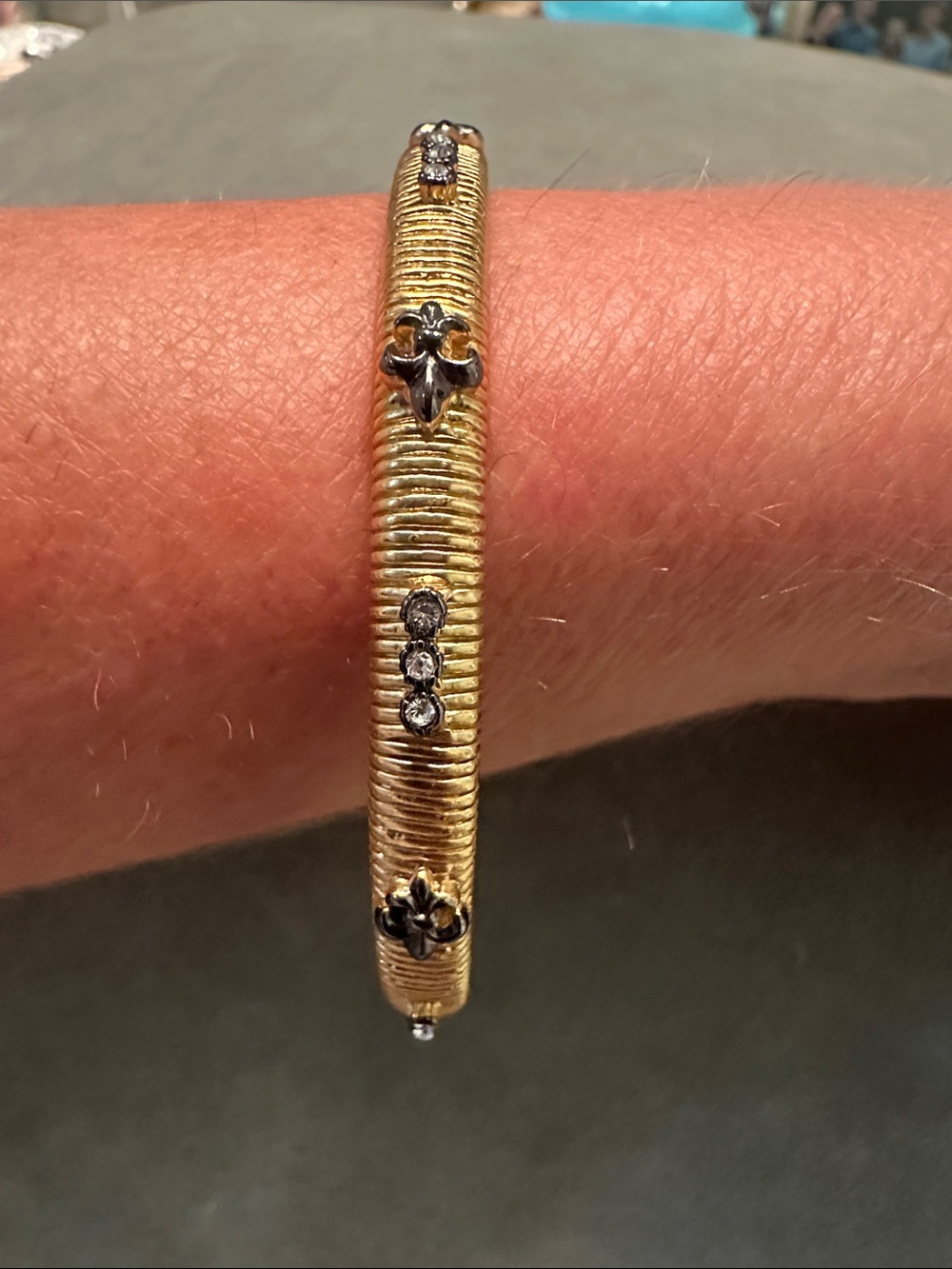 Gold Tone Fleur-de-Lis Crystal Accent Bangle Bracelet